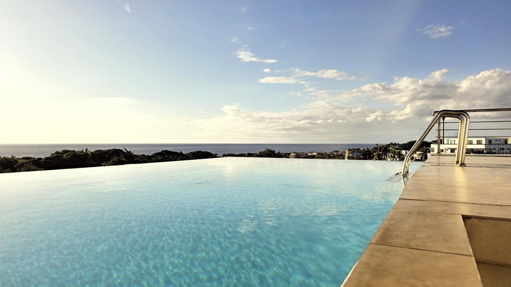 Апартаменти Luxury Penthouse With Infinity Pool & Stunning Sea View Flic en Flac Екстер'єр фото